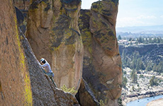 Aubrey Corbett in 2022, climbing a mountain