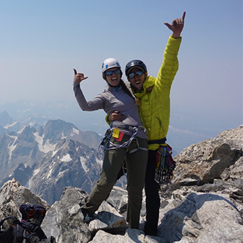 Aubrey Corbett and a friend on top of a mountain