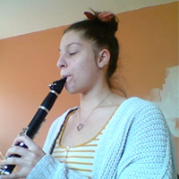 Natalie Doucette playing the clarinet