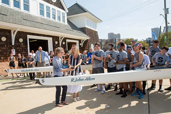 A boat named for R. John Alton is christened with champagne