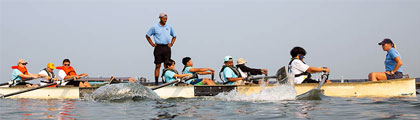 rowing coach instructing participants