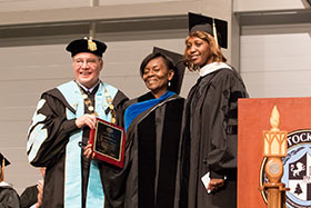 Sonia Gonsalves receiving a distinguised service award