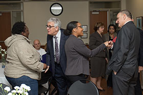 Leo Schoffer shaking hands