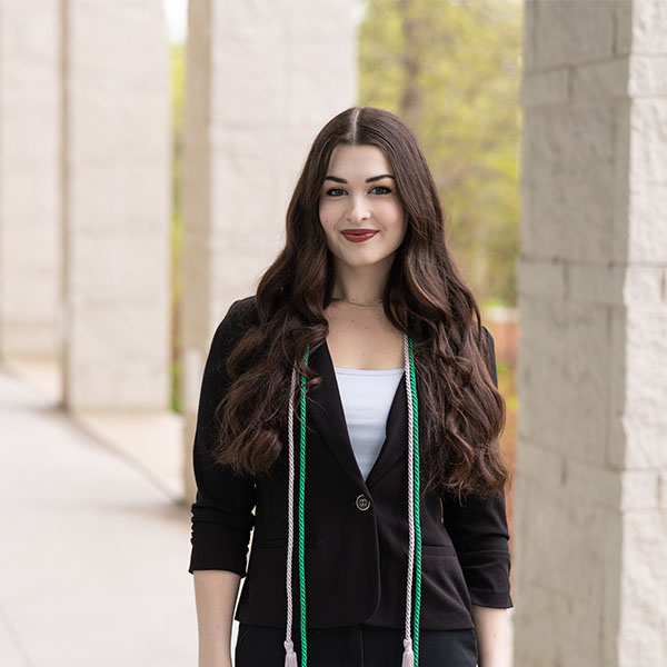 Danielle Cordivari poses in front of the Campus Center.