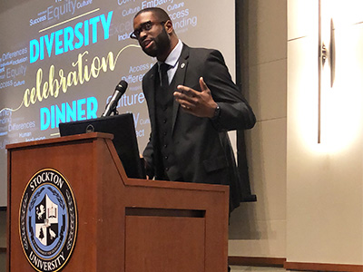 Ike Ejikeme giving a presentation at Stockton