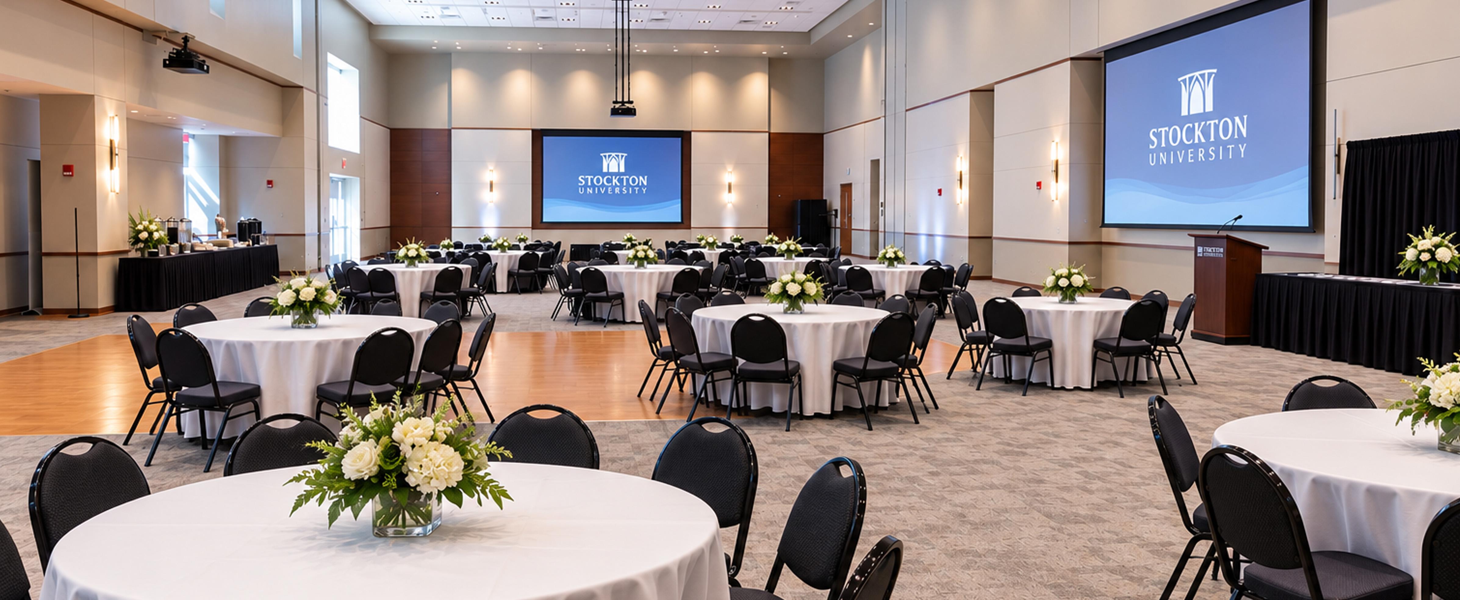 Main event room set with 2 projector screens down