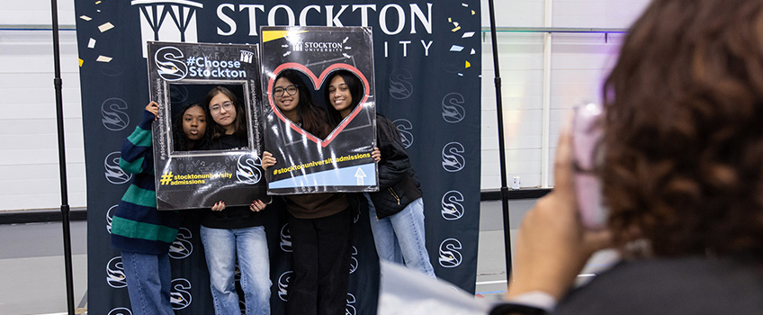 Students enjoying a Photo booth station Students enjoying a Photo booth station