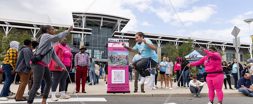 Students jump roping in front of the Campus Center  Students jump roping in front of the Campus Center