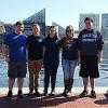 William Murphy, Lt. Ross Clouser, Cpt. Kelly Warantz, Megan Warantz, Sgt. Mike Clancy in front or Baltimore's Inner Harbor for NCEMSF Conference.