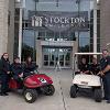 Cpt. Kelly Warantz, Mike Clancy, Brittney Bouchard, Lt. Nick Amos, Sgt. Ross Clouser, Joe Lizza with Welcome Week golf carts