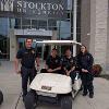 Joe Lizza, Lt. Nick Amos, Sgt. Ross Clouser, Cpt. Kelly Warantz in golf cart during welcome week