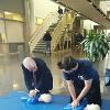 Dr. Harvey Kesselman, Mike Clancy: President Kesselman learning Hands-Only CPR