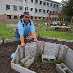 David Lockwood, a 2018 Sustainability graduate, now manages the community garden with the help of interns and volunteers. 