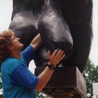 Placing a statue in the Arts & Sciences courtyard, 1994-95.