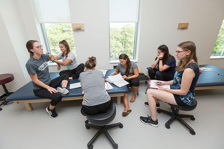 Students engage in hands-on learning in the new Physical Therapy Lab on the third floor of the Health Sciences Building. | Photo by Susan Allen Students engage in hands-on learning in the new Physical Therapy Lab on the third floor of the Health Sciences Building. | Photo by Susan Allen