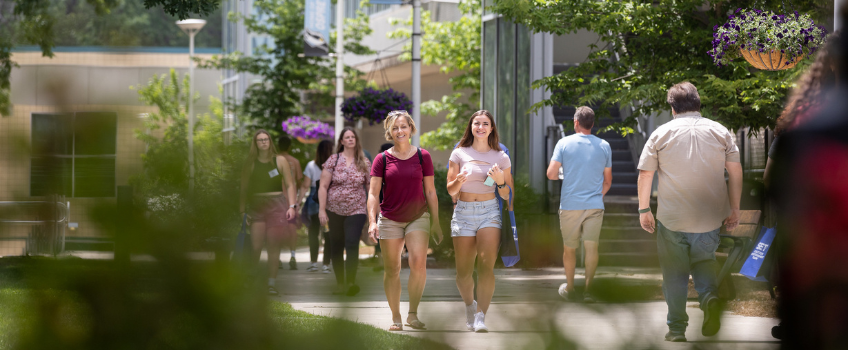 Family Walking on Galloway Campus Family Walking on Galloway Campus