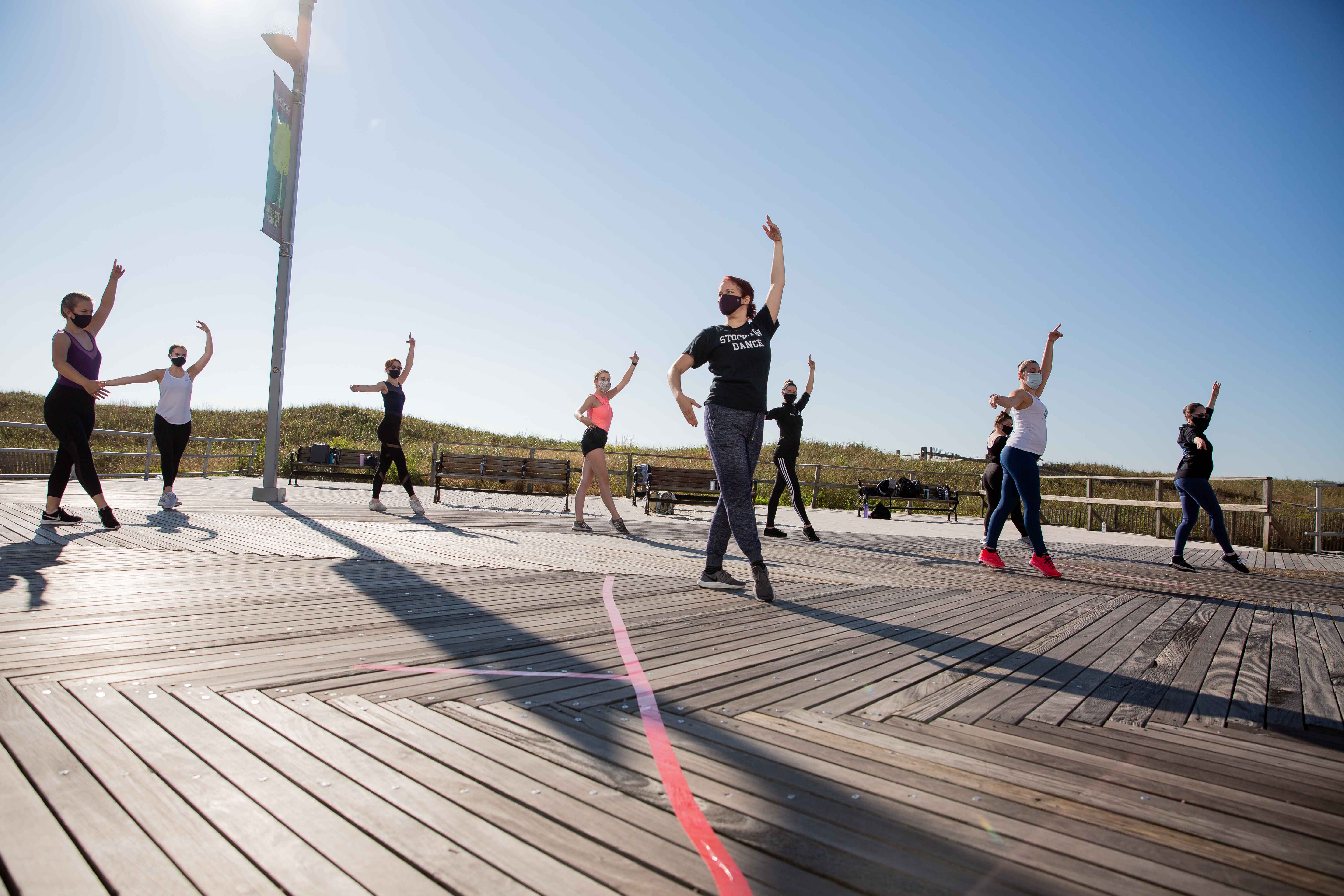 Rain Ross took her students to the boardwalk for class.  Rain Ross took her students to the boardwalk for class.