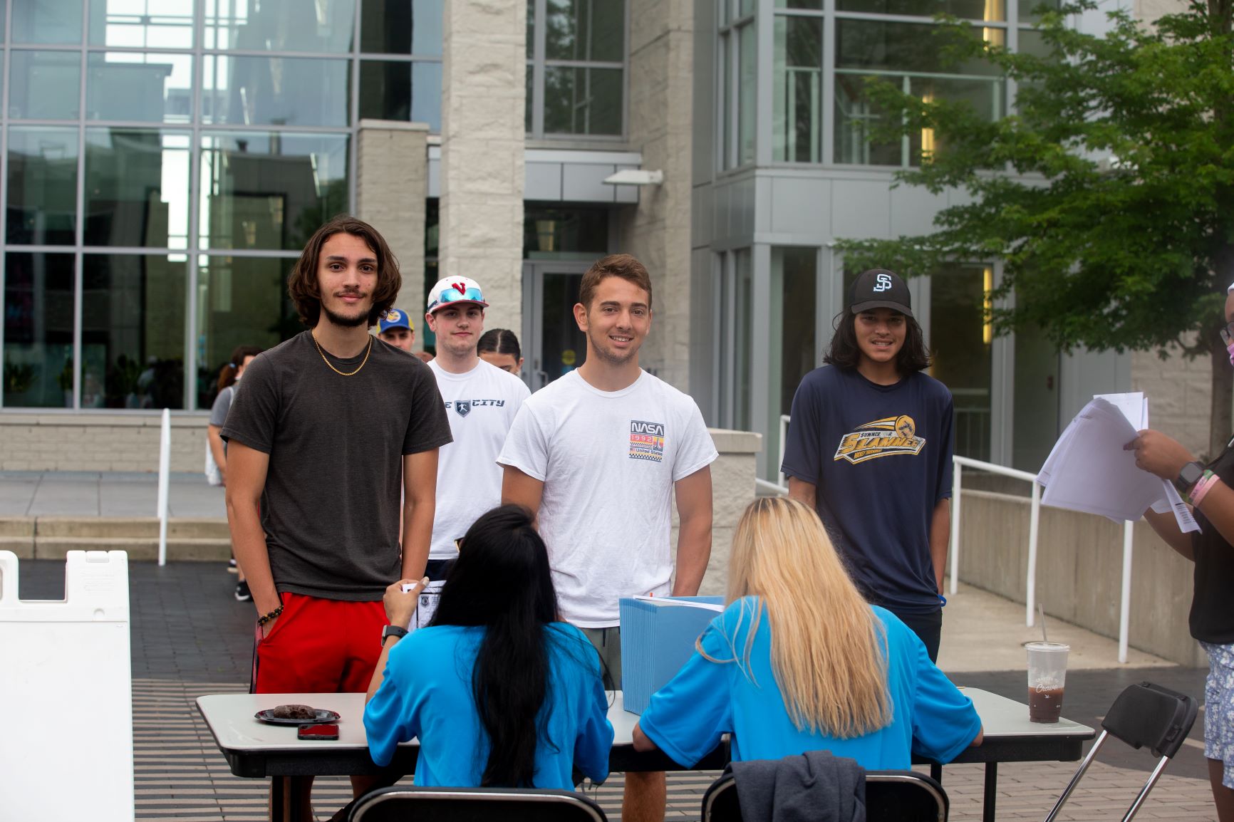Big smiles can be seen during check in in anticipation of the day to come. Big smiles can be seen during check in in anticipation of the day to come.