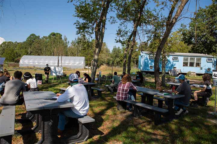 Students learn outdoors at the Sustainable Farm Students learn outdoors at the Sustainable Farm