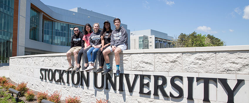 Students sitting outside Students sitting outside