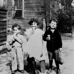 Edwin, Judith, and Leonard Greenblatt enjoying ice cream cones, 1925
