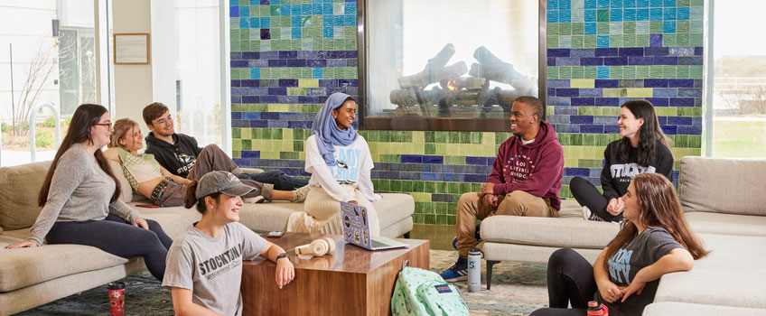 Students meeting in front of the fireplace in Atlantic City Students meeting in front of the fireplace in Atlantic City