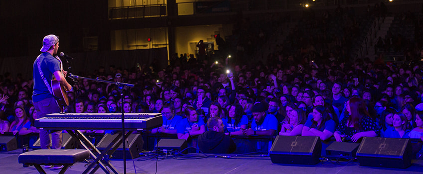 More students at a Woodstockton concert More students at a Woodstockton concert