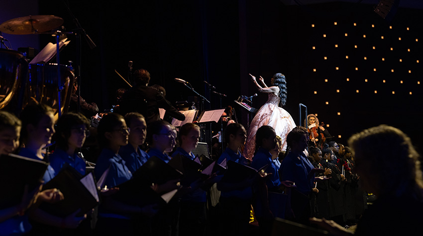 Bev in midst of her choir during Messiah Bev in midst of her choir during Messiah