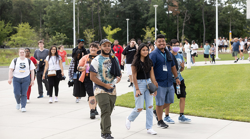 Students walking during orientation Students walking during orientation