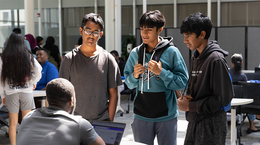 GOALS students listening to an academic advisor GOALS students listening to an academic advisor