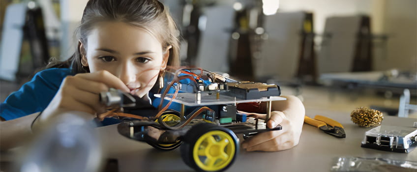 Child Building a toy car Child Building a toy car