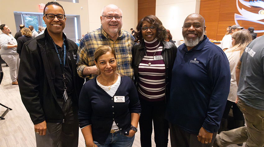 Staff members posing for a photo at the Autumn Jam. Photos by Susan Allen.  Staff members posing for a photo at the Autumn Jam. Photos by Susan Allen.