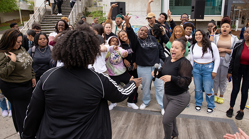 Jovin Fernandez, director of the Multicultural Center, joined the celebration outside the center. Jovin Fernandez, director of the Multicultural Center, joined the celebration outside the center.
