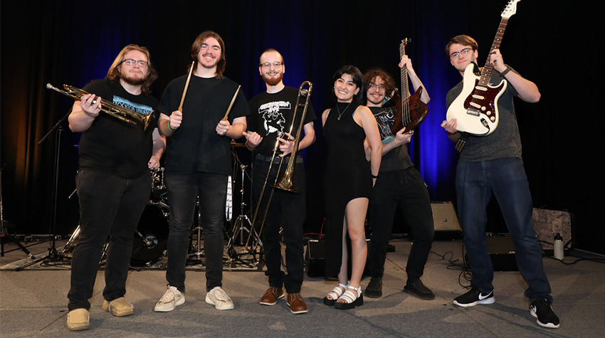 Student music performers posing for a photo Student music performers posing for a photo