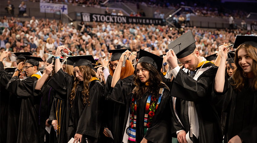 Students during the tassel part of the Commencement Students during the tassel part of the Commencement