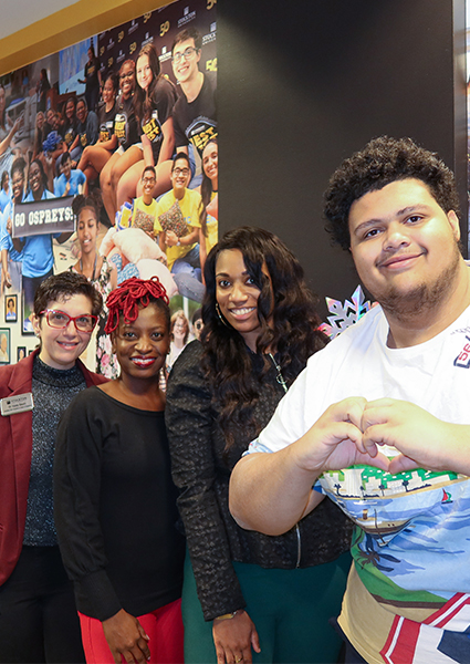 Attendees of the December unveiling posing for photos  Attendees of the December unveiling posing for photos