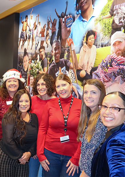 Attendees of the December unveiling posing for photos  Attendees of the December unveiling posing for photos