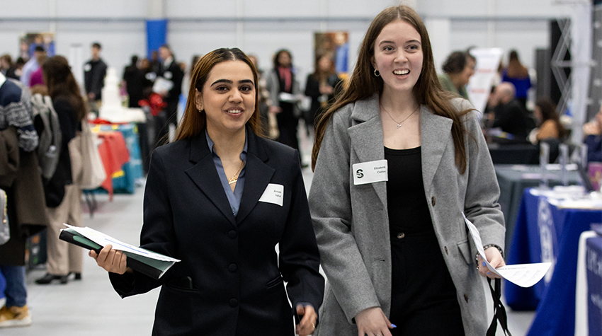 Students dressed to impress with resumes in hand for the Career Fair Students dressed to impress with resumes in hand for the Career Fair