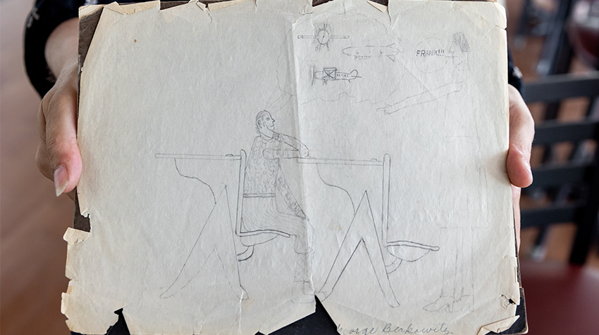 A drawing attributed to George Berkowitz. It shows a child at a desk daydreaming about airplanes as their teacher reprimands him.  A drawing attributed to George Berkowitz. It shows a child at a desk daydreaming about airplanes as their teacher reprimands him.