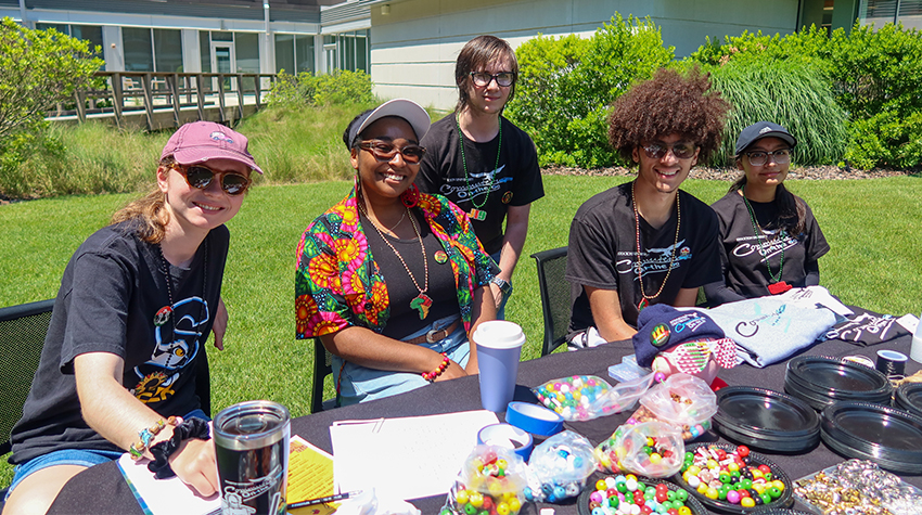 Students part of the organization "Commuters on the Go" and Louie Kennedy (center in red) Students part of the organization "Commuters on the Go" and Louie Kennedy (center in red)