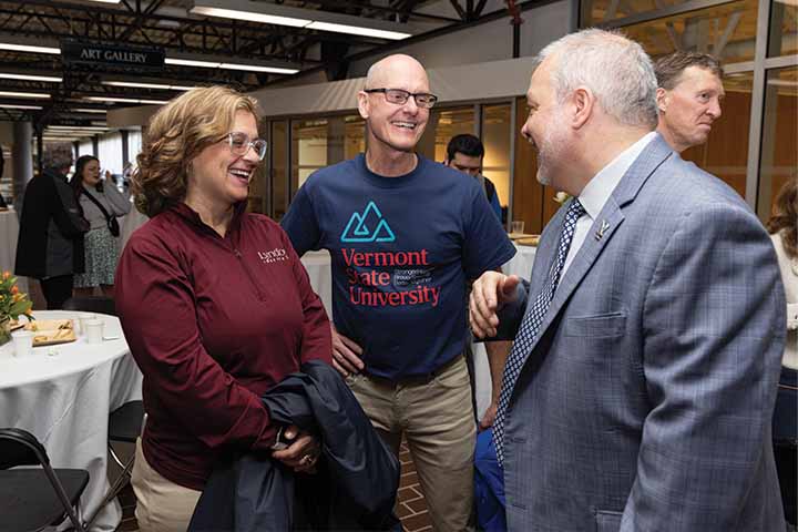 Maroon, navy, and cyan of Lyndon State and Vermont State University were prominent at Inauguration Maroon, navy, and cyan of Lyndon State and Vermont State University were prominent at Inauguration