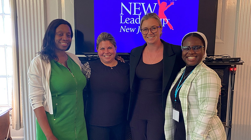 Detty posing with instructors in the program. 
Photo courtesy of Exantus. Detty posing with instructors in the program. 
Photo courtesy of Exantus.