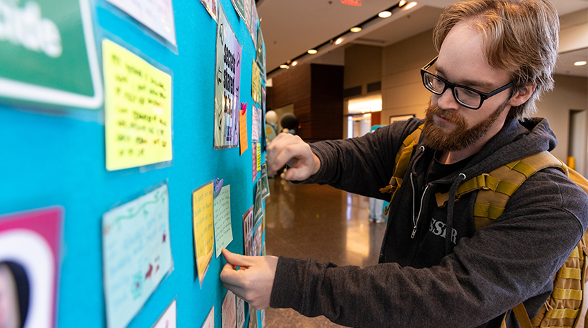 Students shared secrets anonymously for one of the fair's stations. Students shared secrets anonymously for one of the fair's stations.