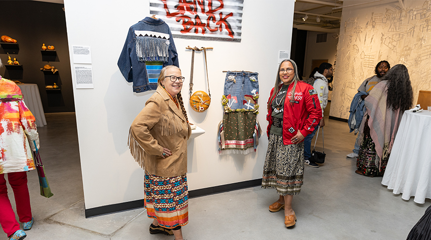 Denise "Bright Dove" Ashton-Dunkley and her mother in front of her art Denise "Bright Dove" Ashton-Dunkley and her mother in front of her art