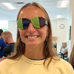 Another student wearing special two-toned sunglasses.  What could their use be?