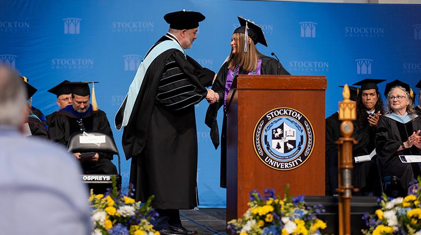 Casey Berchtold was one of the student speakers for the masters/doctoral commencement on campus Casey Berchtold was one of the student speakers for the masters/doctoral commencement on campus