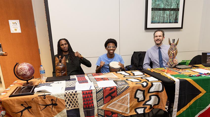Student Jayden Hamlet (middle) with Professors Kimoni Yaw Ajani (left) and Robert Barney (right) Student Jayden Hamlet (middle) with Professors Kimoni Yaw Ajani (left) and Robert Barney (right)