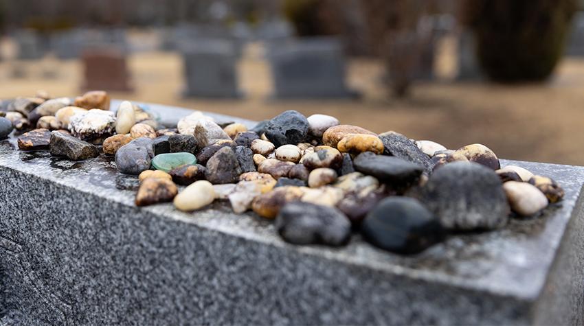 Stones covering a headstone in Rodef Shalom Cemetery. Stones covering a headstone in Rodef Shalom Cemetery.