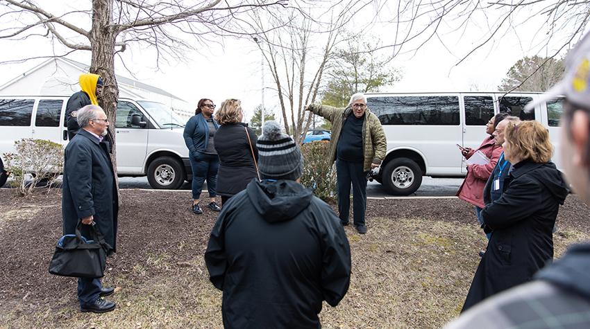 Leo talking with the group about his home and farm, now a Wawa. Leo talking with the group about his home and farm, now a Wawa.