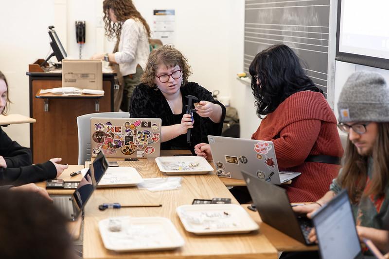 Archaeology Minor Students Examining Artifacts Archaeology Minor Students Examining Artifacts